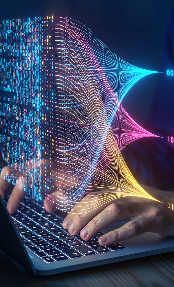 Person typing on a laptop keyboard, with colorful data streams and binary code representing digital transformation.